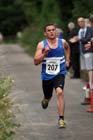 Karl Taylor (Morpeth) finishing 2nd in the Morpeth 10k Road Race.